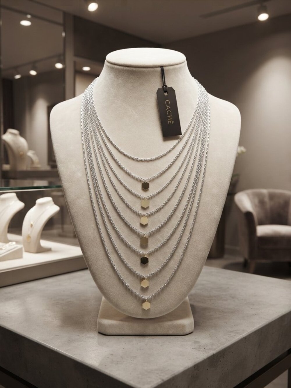 CACHE multi-layered 9-strand layered silver necklace with gold charms